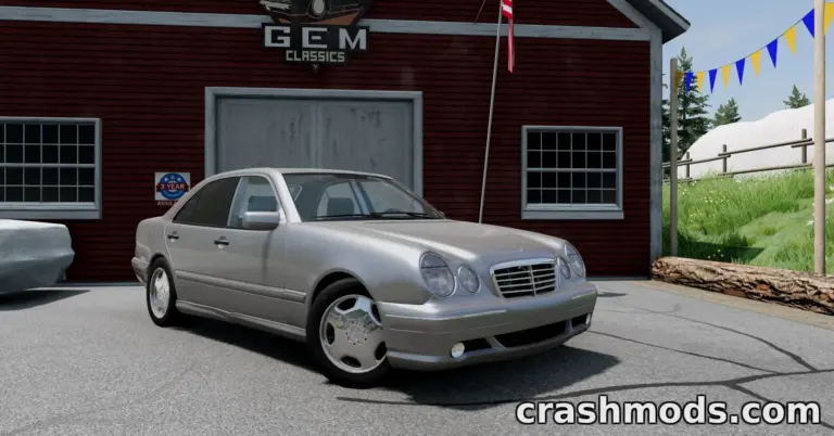 Silver Mercedes-Benz W210 parked outside a classic car garage in BeamNG.drive, showcasing detailed modding features.