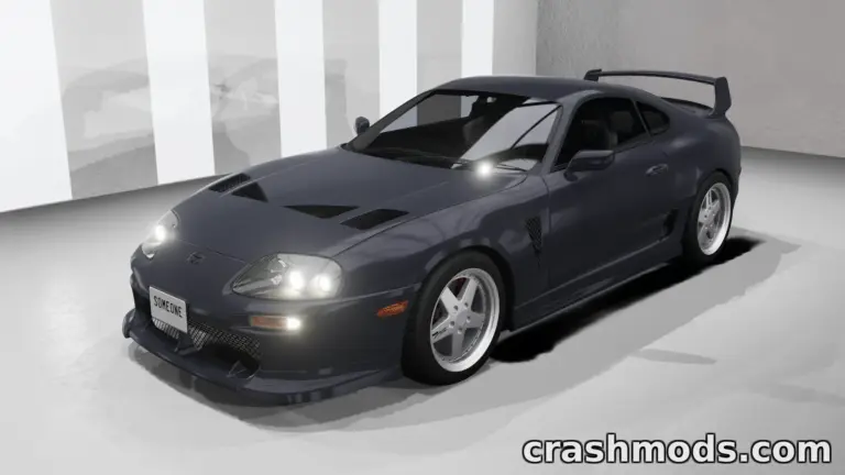 Toyota Supra mod for BeamNG.drive showcases a sleek, dark gray sports car with a prominent rear wing and custom wheels.
