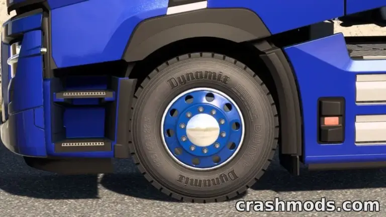 Close-up of a blue truck's wheel featuring a detailed tire and dynamic rim design in Euro Truck Simulator 2 mod.