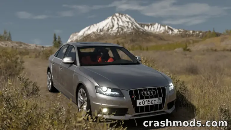 Audi A4 B8 parked on a rugged mountain trail in BeamNG.drive, showcasing its sleek design and detailed environment.