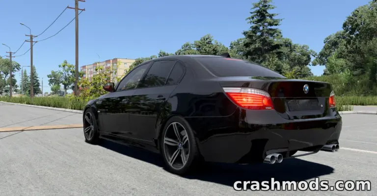 The BMW M5 E60 showcases sleek design and dynamic rear view, driving on a sunny street in BeamNG.drive.