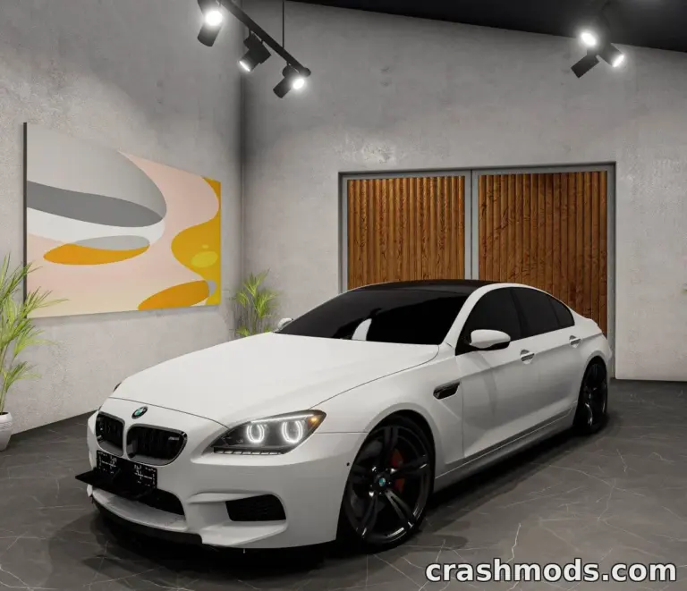A sleek white BMW M6 F13 (2012–2018) parked in a modern showroom with stylish lighting and decor.