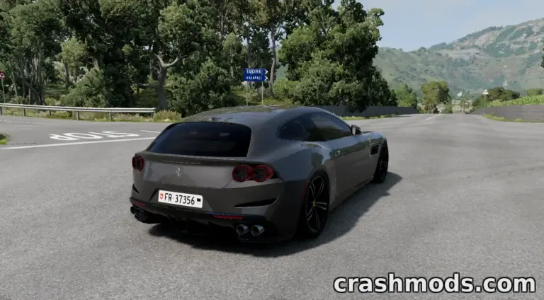 Ferrari GTC4 Lusso mod showcased in BeamNG.drive, driving on a scenic road with lush greenery.