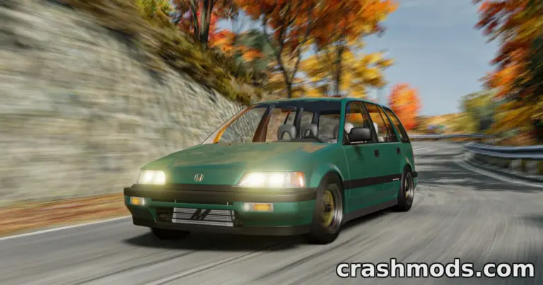 A modified Honda Civic RT4WD speeds around a winding road, showcasing vibrant autumn foliage.