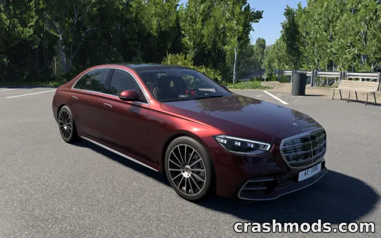 The sleek Mercedes-Benz S-Class (W223) parked on a sunny street, showcasing its detailed design and modern features.
