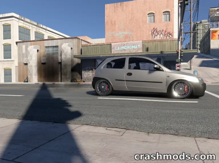 Modified Opel Corsa 0.39 cruising down a city street in BeamNG.drive, showcasing its sleek design and custom wheels.