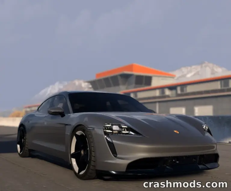 Porsche Taycan mod for BeamNG.drive showcases a sleek, low-profile electric car on a racetrack.