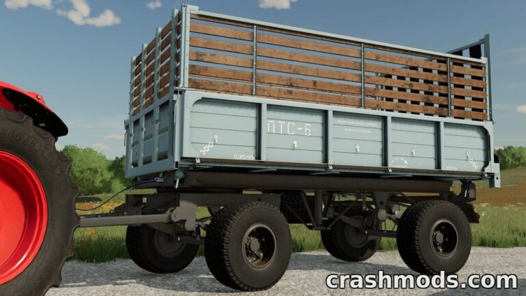 A detailed trailer mod for Farming Simulator 22, showcasing a blue cart with wooden slats and rugged wheels.