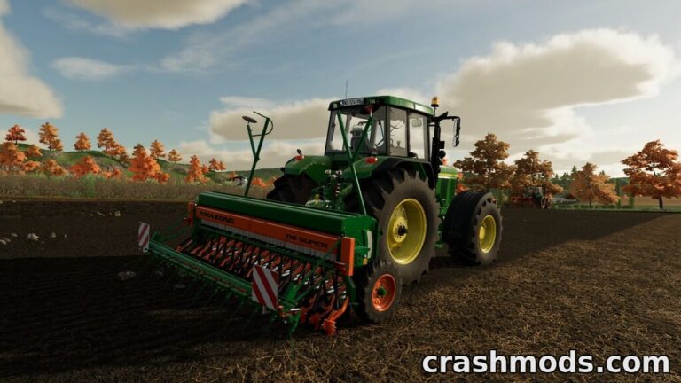Amazone D8 40 seeder attached to a tractor, preparing the field for planting in Farming Simulator 22.