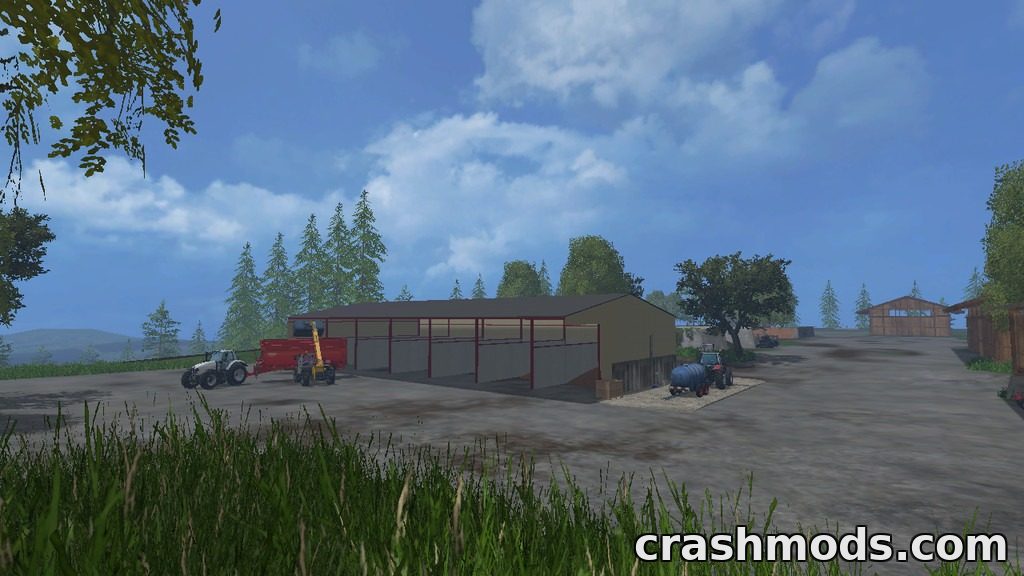 A detailed farm scene featuring a livestock barn and tractors, showcasing the reworked Bjornholm map in Farming Simulator 15.