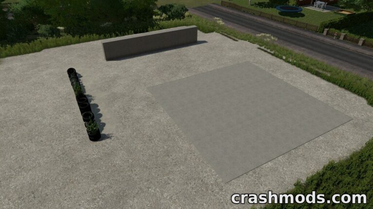 Aerial view of the Bunker Silo Kit featuring a concrete pad and tire partitions for Farming Simulator 22.