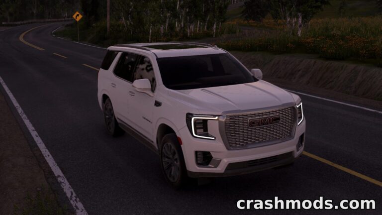 A sleek GMC Yukon Denali SUV equipped with police parts and dual V8 engines drives along a winding road.