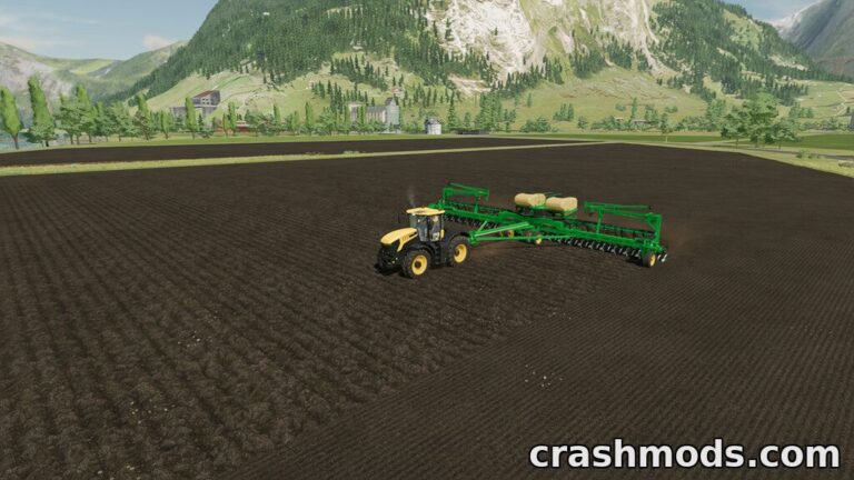 A yellow tractor operates the Great Plains YP-2425A precision planter on a freshly plowed field in Farming Simulator 22.