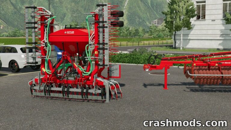 The Güttler Greenmaster 600 is showcased in a Farming Simulator 22 environment, ready for grassland weeding and seeding.