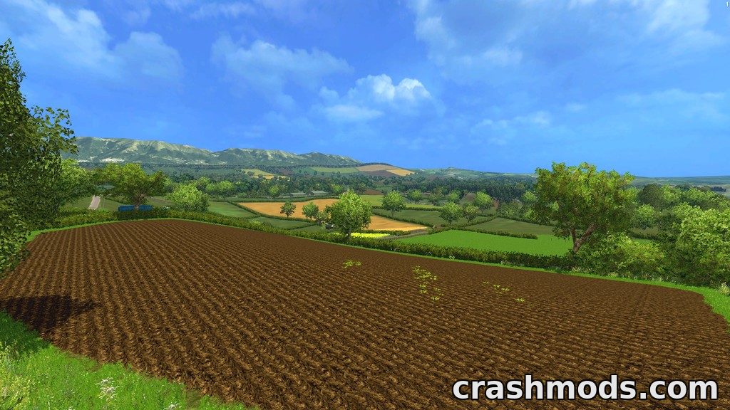 Lush, expansive fields stretch across the Dorset landscape in this Farming Simulator 15 mod, showcasing detailed farming terrain.
