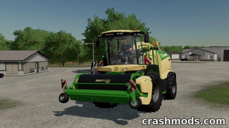 A forage harvester equipped with the Krone EasyFlow 380 S pick-up header is ready for action in a farming landscape.