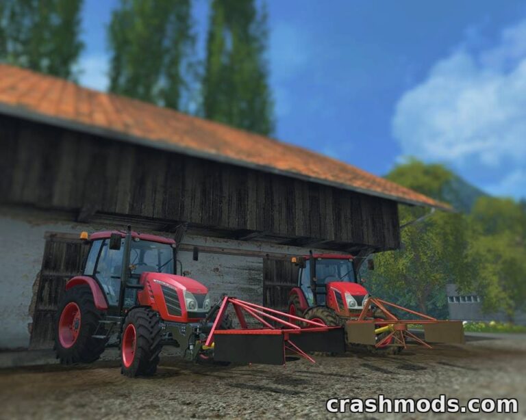 Two red tractors equipped with silage spreaders parked in front of a rustic barn in Farming Simulator 15.