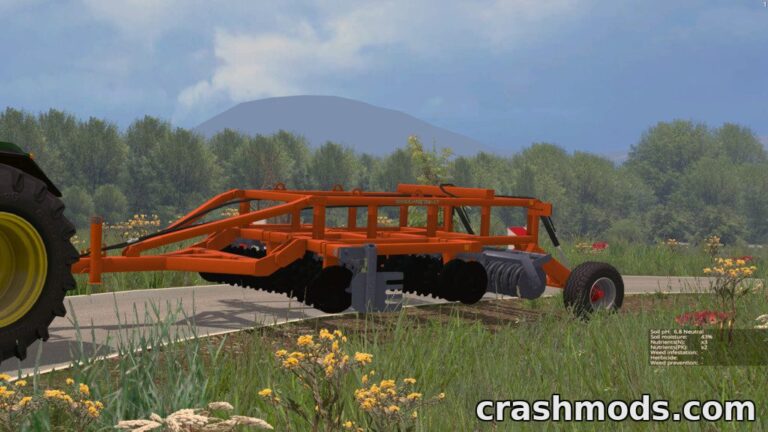 A vibrant orange heavy disc harrow is mounted on a tractor, ready for tilling fields in Farming Simulator 15.