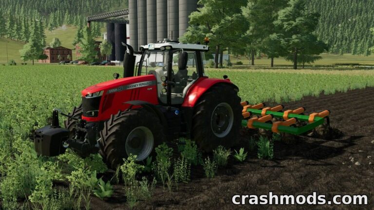 A red tractor equipped with the Famed Chisel Pack plows a lush green field in Farming Simulator 22.
