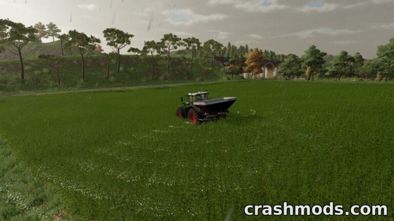 A tractor operates the Lizard WM XL spreader, distributing fertilizer across a lush green field in Farming Simulator 22.