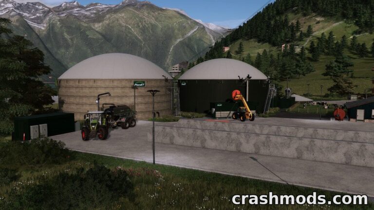 A biogas plant setup in Farming Simulator 22, featuring large digesters and farming equipment in a mountainous landscape.