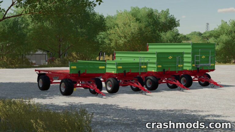 Three green Strautmann SZK 802 farm trailers lined up on a gravel surface, ready for use in Farming Simulator 22.