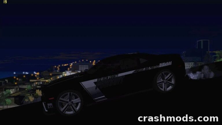A sleek 2012 Chevrolet Camaro ZL1 RCPD police car is showcased on a hillside at night, overlooking a city skyline.