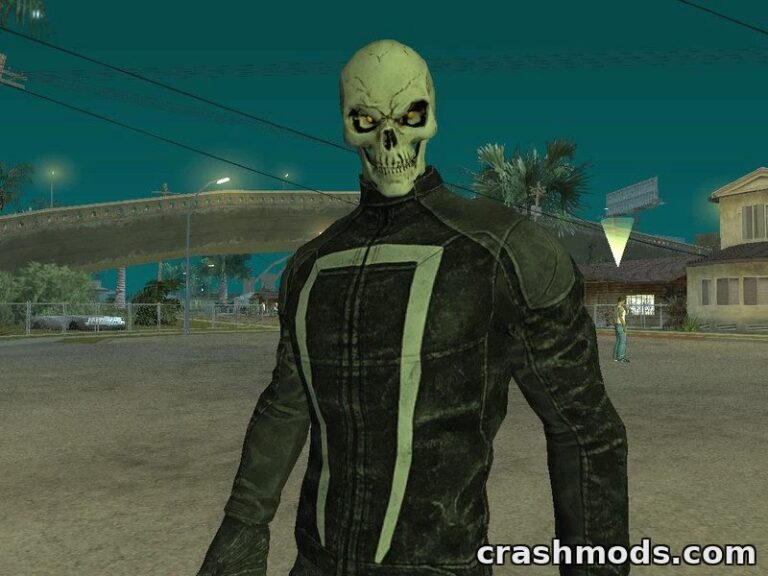 Robbie Reyes as Ghost Rider stands menacingly in a dark urban setting, showcasing his skeletal features and leather outfit.