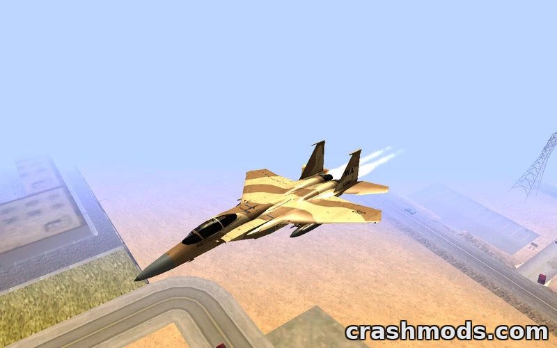 A detailed McDonnell Douglas F-15E Aggressor jet soars above a desert landscape in GTA San Andreas.